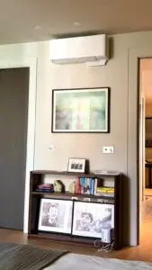 Wall‑mounted split air conditioning system installed in a residential lounge in Islington