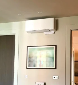 Wall‑mounted split air conditioning system installed in a residential lounge in Islington