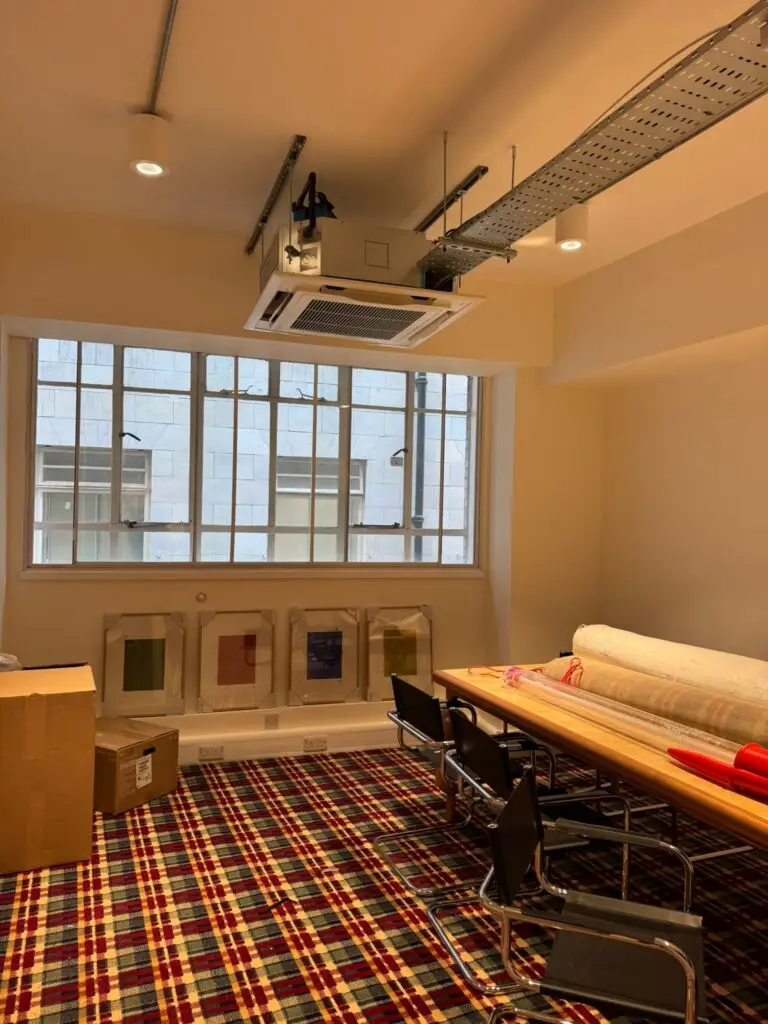 Commercial area room with ceiling air conditioning installed