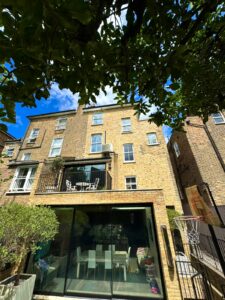 Exterior of an Islington property with air conditioning installation