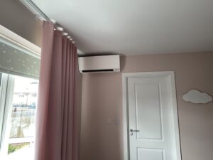 Wall-mounted air conditioning unit in a Kensington childs bedroom
