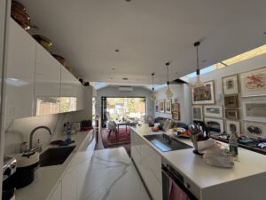 Air conditioning unit in an open-plan kitchen and dining extension in Teddington